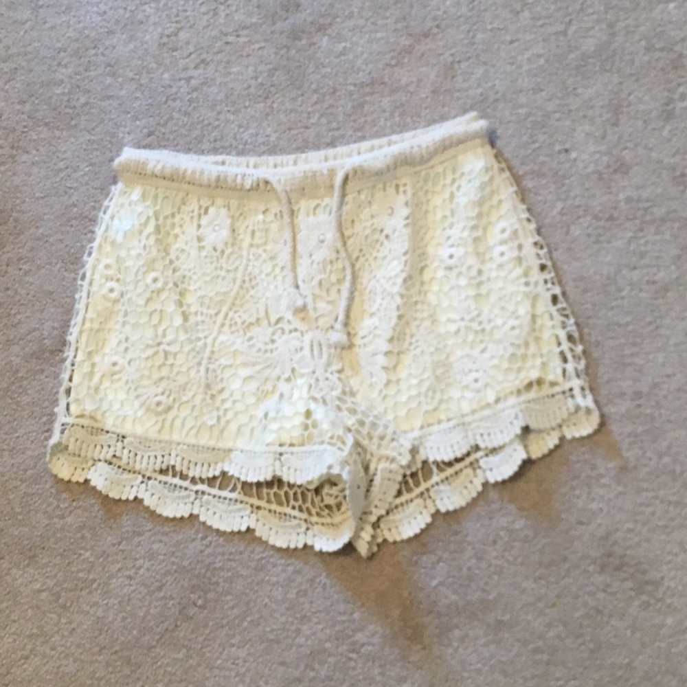 Lace cream shorts.